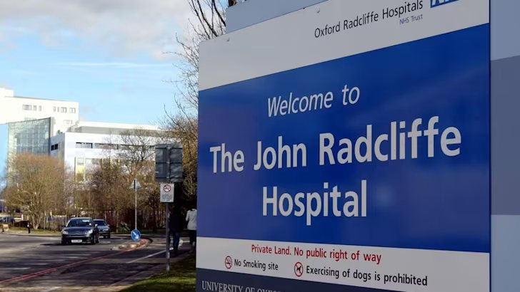 Entrance sign of the John Radcliffe Hospital, Oxford University Hospitals NHS Trust.
